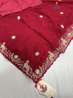 close up detailing of rani synthetic zari embroidery saree