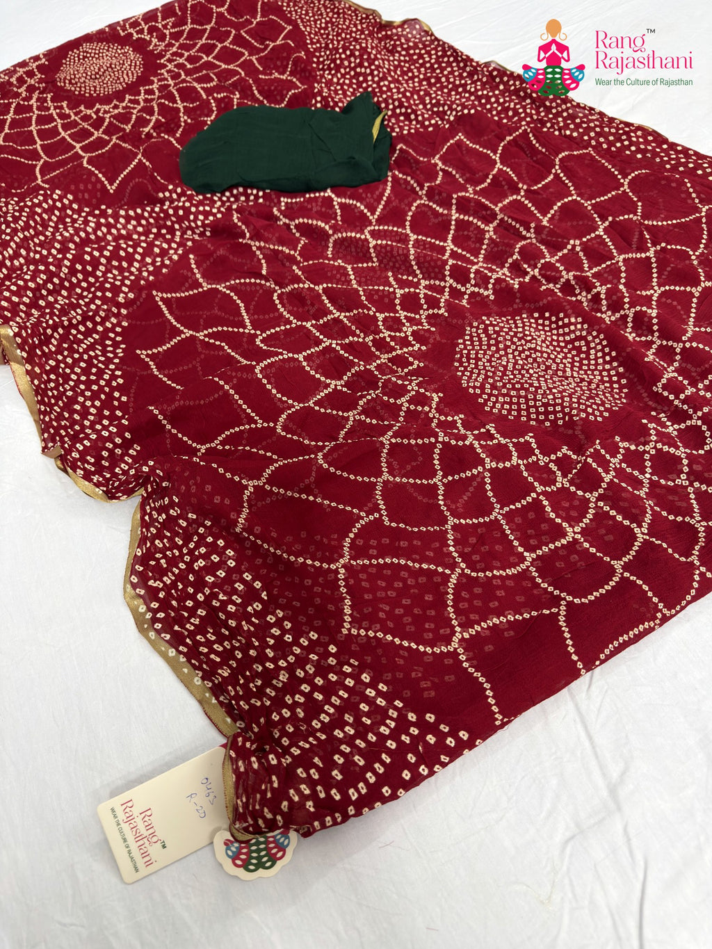 pallu detailing of red chiffon bandhani saree