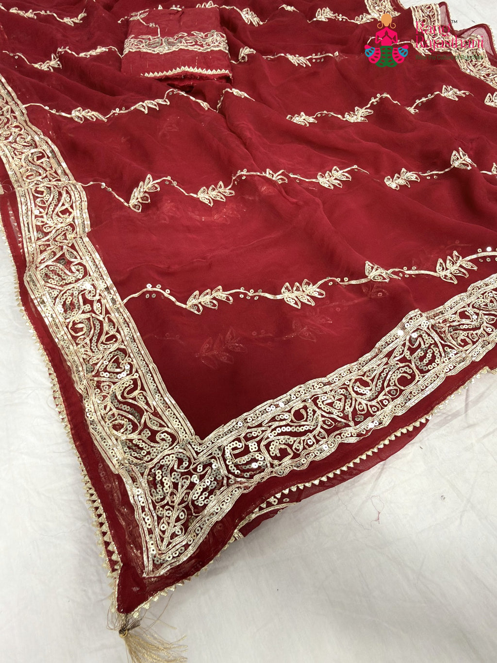 pallu detailing of red chiffon gota patti saree
