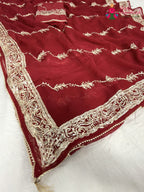 pallu detailing of red chiffon gota patti saree