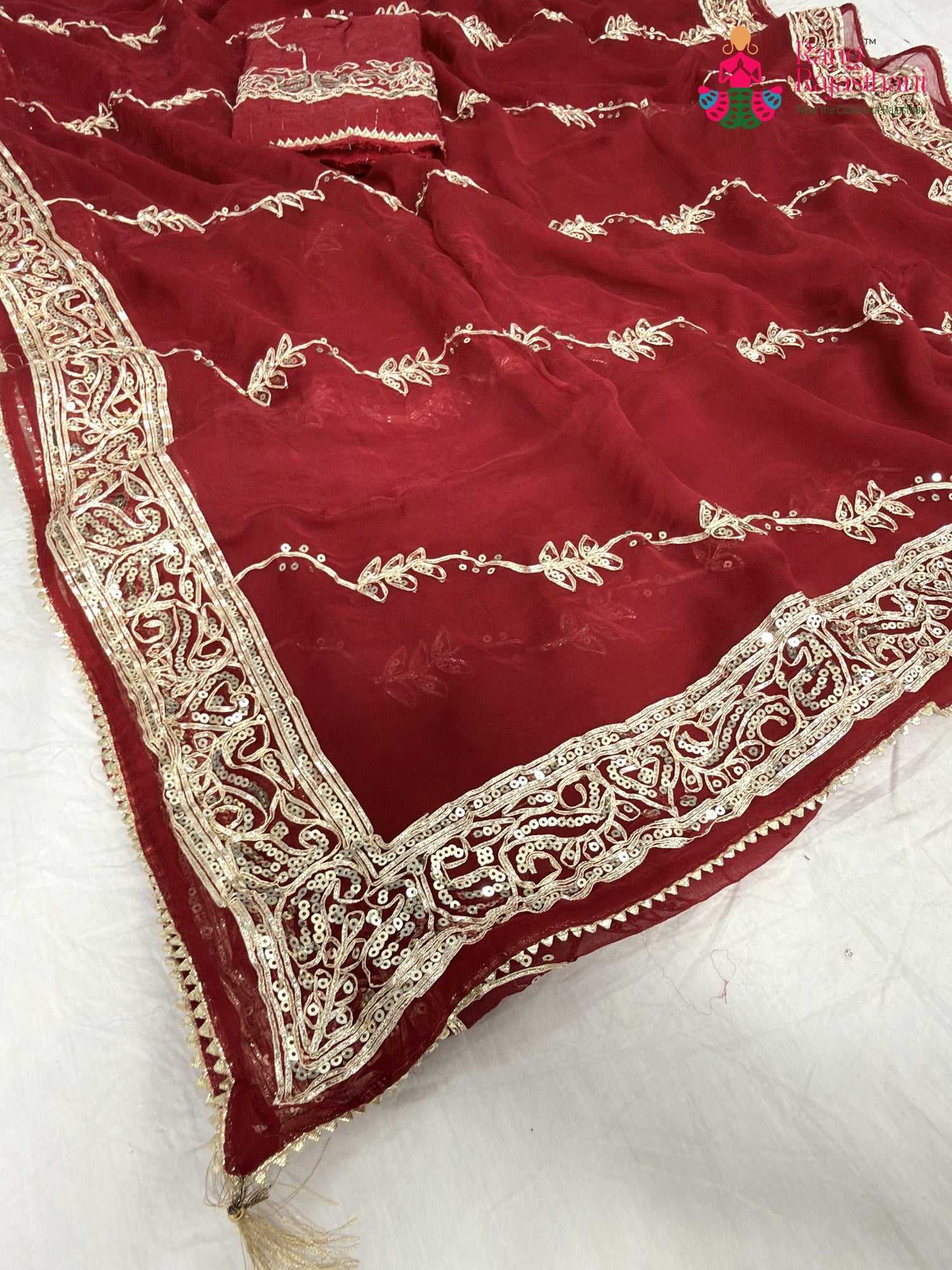 pallu detailing of red chiffon gota patti saree