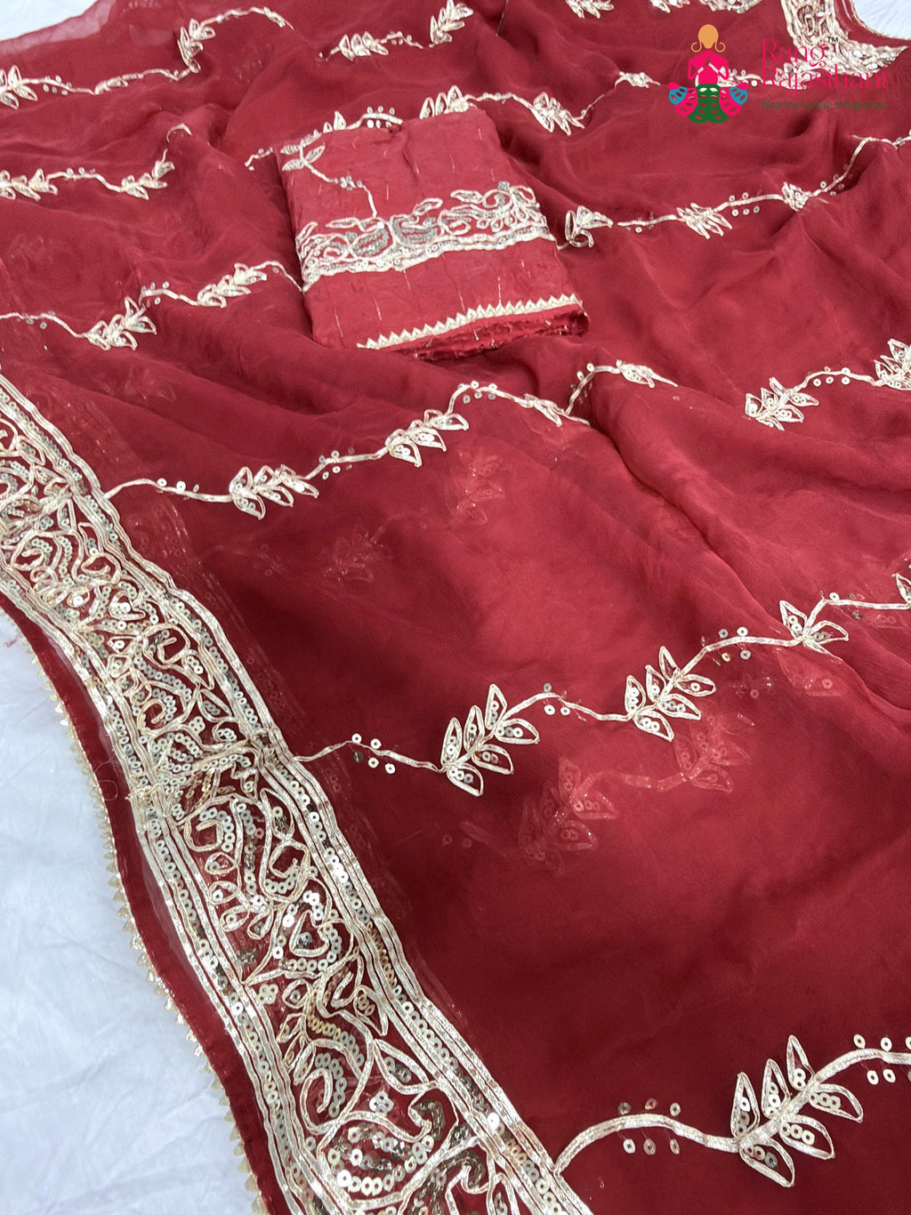 close up detailing of red chiffon gota patti saree