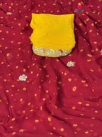 pallu detailing of red chiffon hand embellishment saree