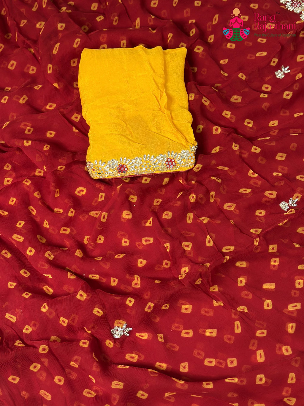 pallu detailing of red chiffon hand embellishment saree