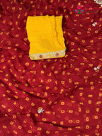 pallu detailing of red chiffon hand embellishment saree