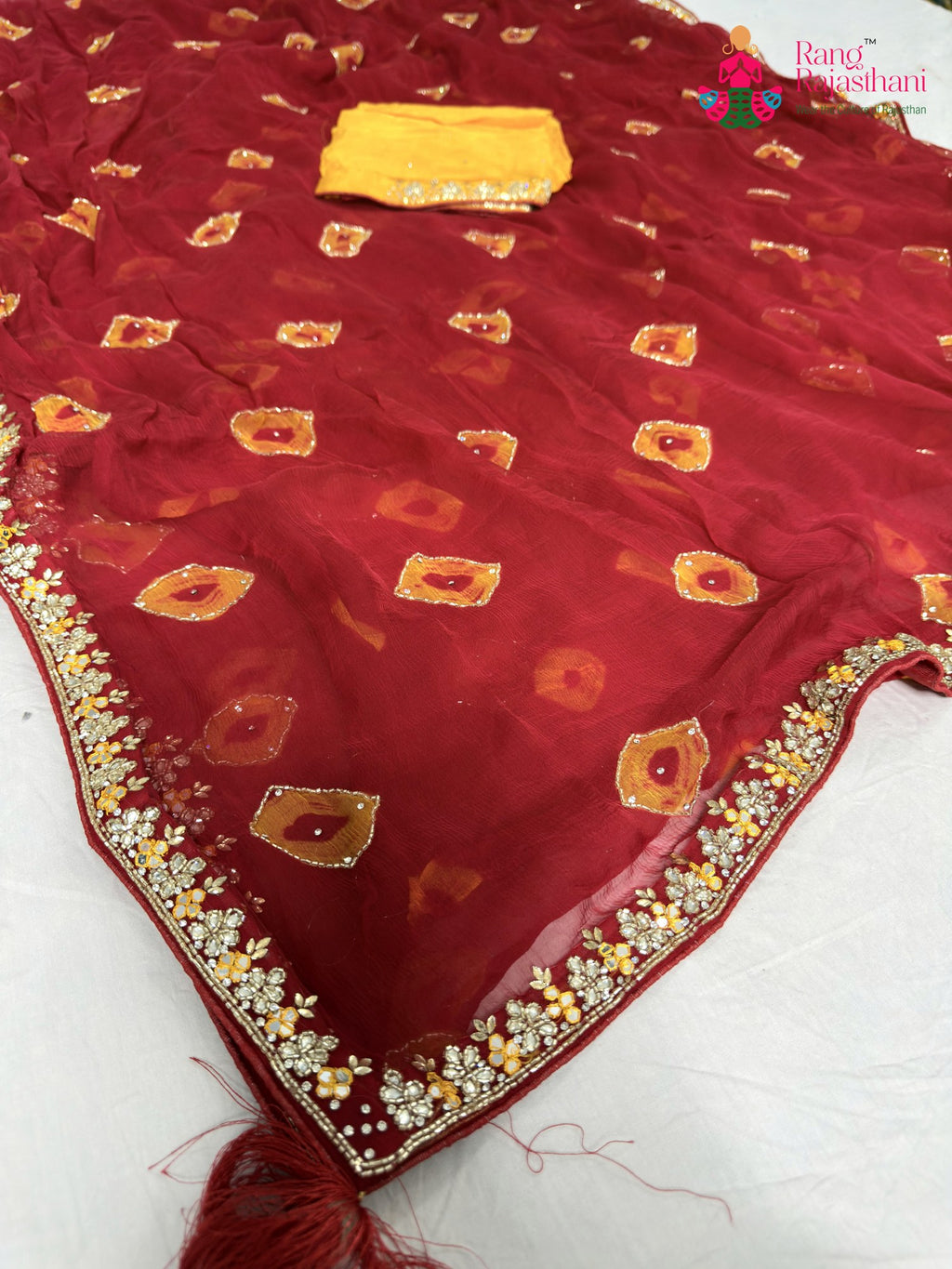 pallu detailing of red chiffon hand embellishment saree