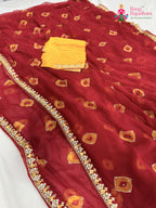 border detailing of red chiffon hand embellishment saree