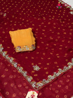 pallu detailing of red chiffon hand embellishment saree