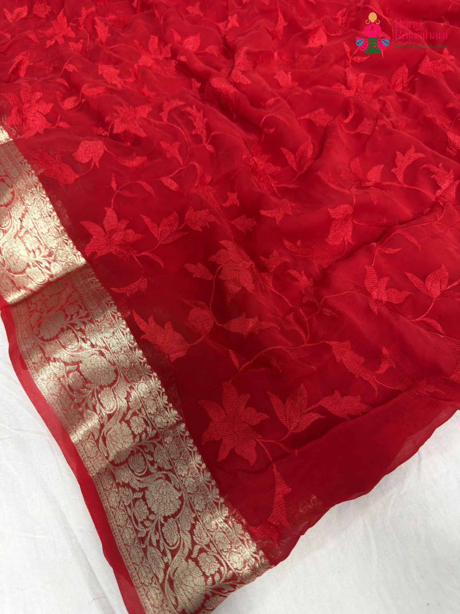 pallu detailing of red chiffon resham embroidery saree