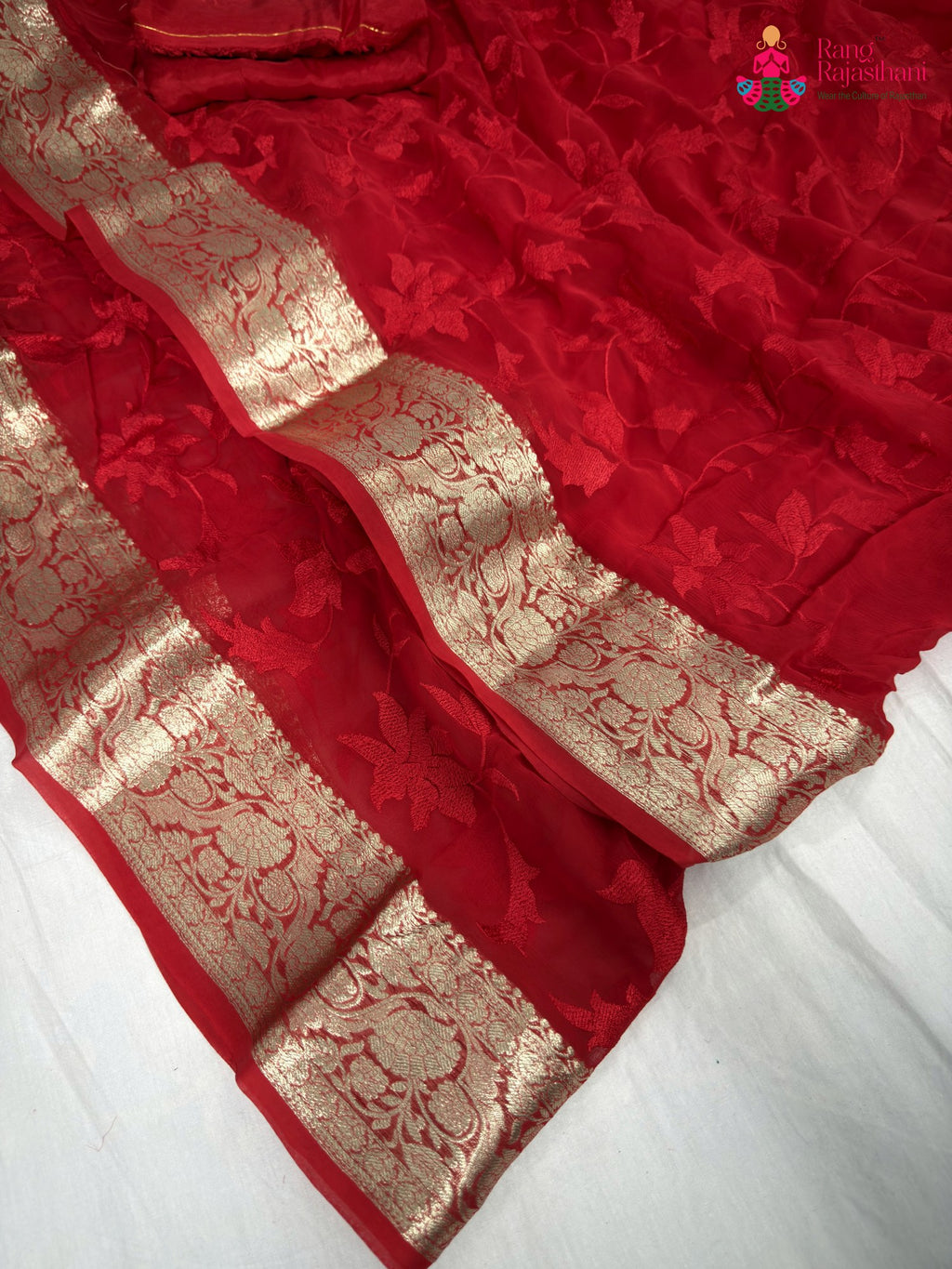 border detailing of red chiffon resham embroidery saree