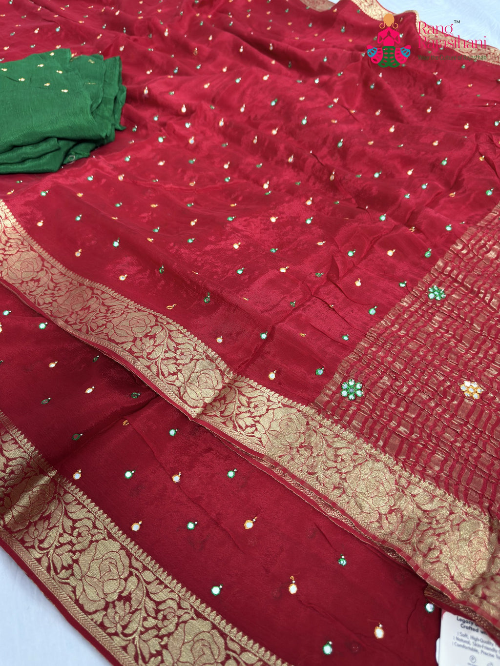 border detailing of red chinnon banarasi zari weave saree