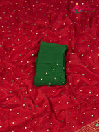 border detail of red chinnon banarasi zari weave saree