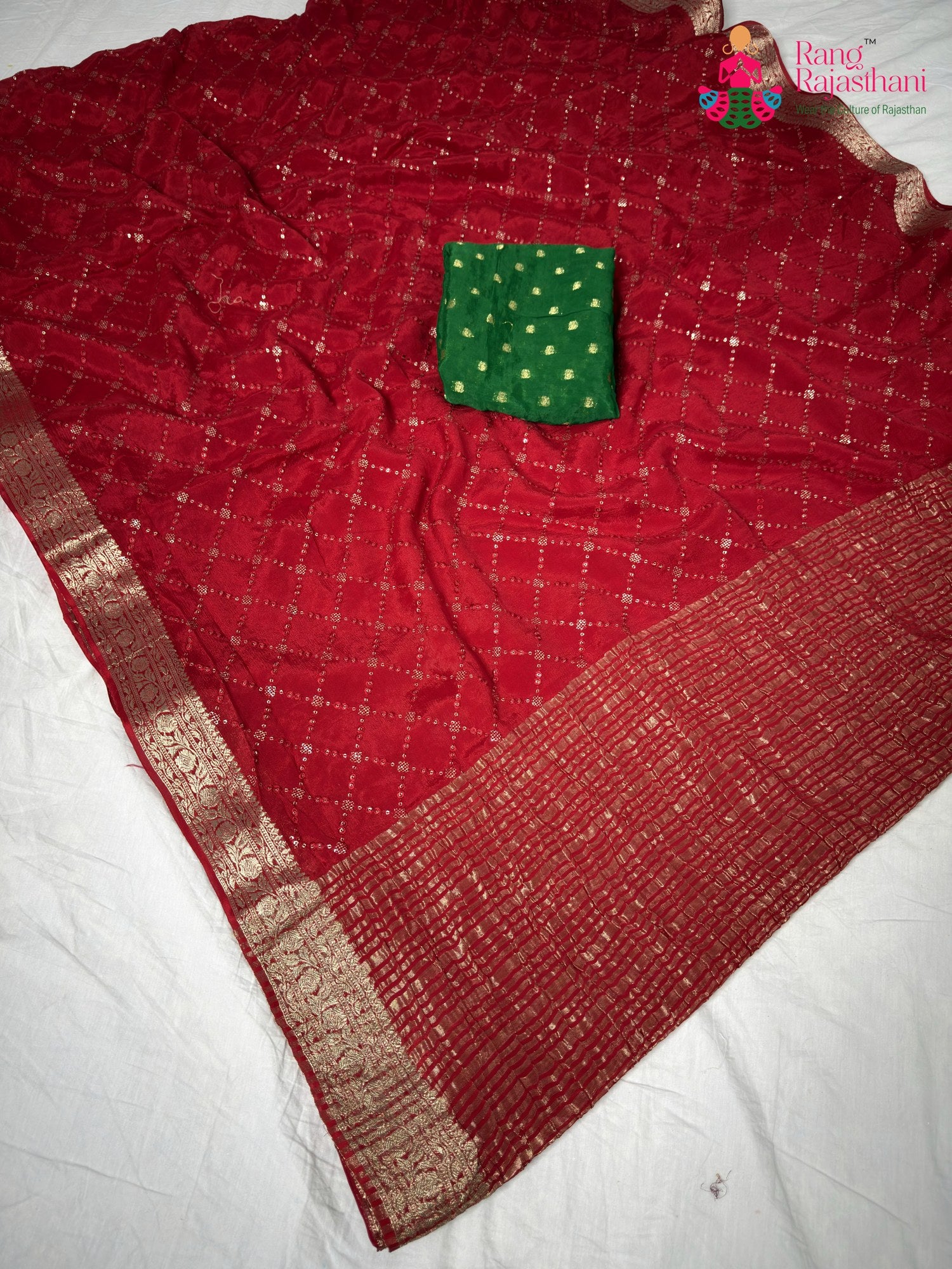 border detailing of red chinnon loom glimmer saree