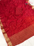 pallu detailing of red chinnon resham embroidery saree