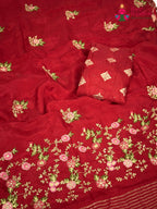 border detail of red chinnon resham embroidery saree