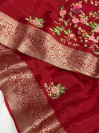 design pattern of red chinnon resham embroidery saree