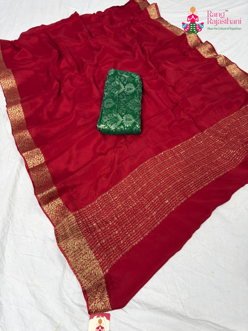 border detailing of red chinnon saree