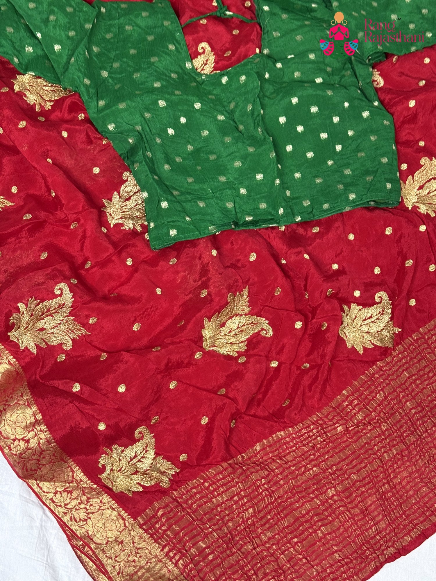 border detailing of red chinnon saree