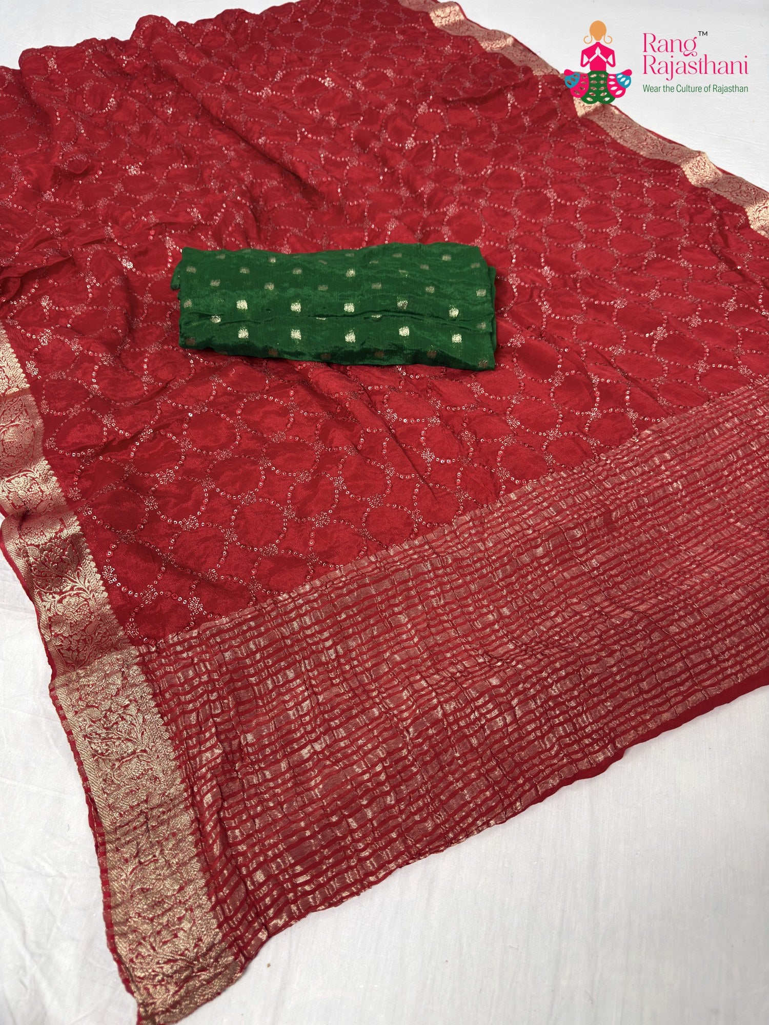 close up detailing of red chinnon sequin saree
