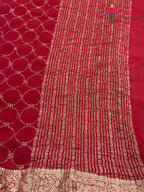 pallu detailing of red chinnon sequin saree