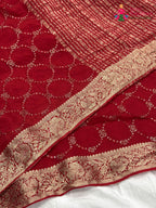 border detail of red chinnon sequin saree