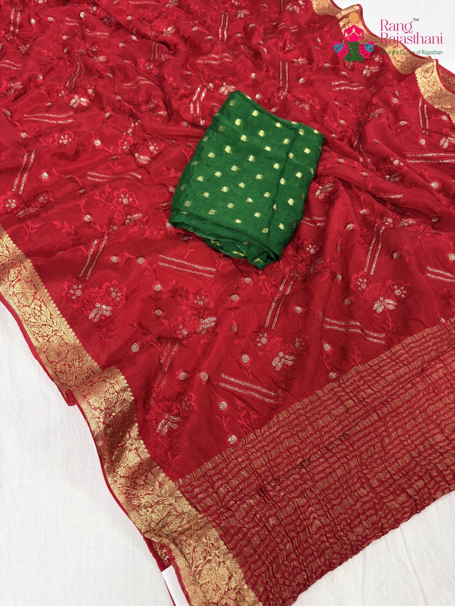 close up detailing of red chinnon sequin saree