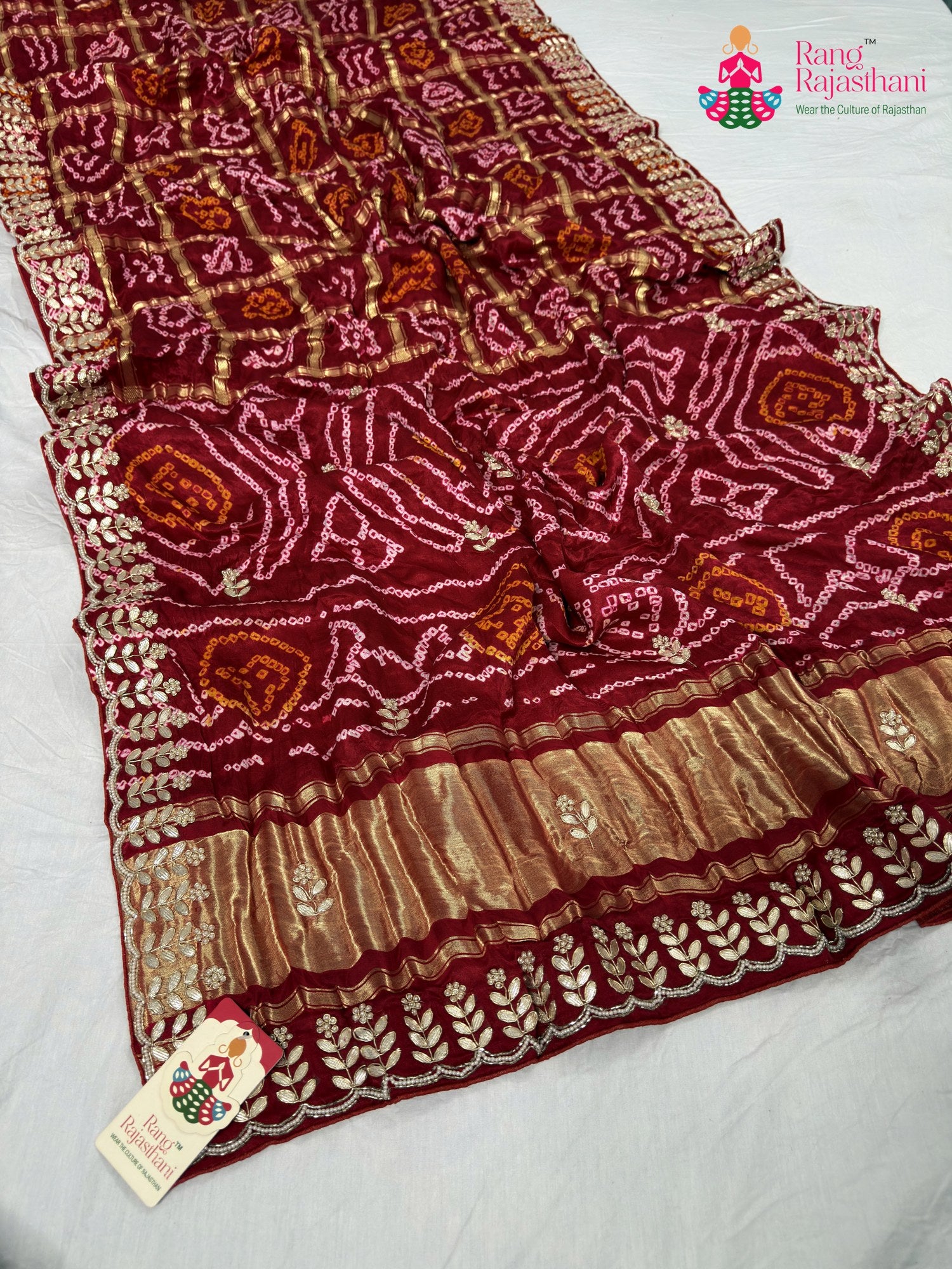 pallu detailing of red gajji silk bandhani saree