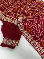 border detailing of red gajji silk bandhani saree