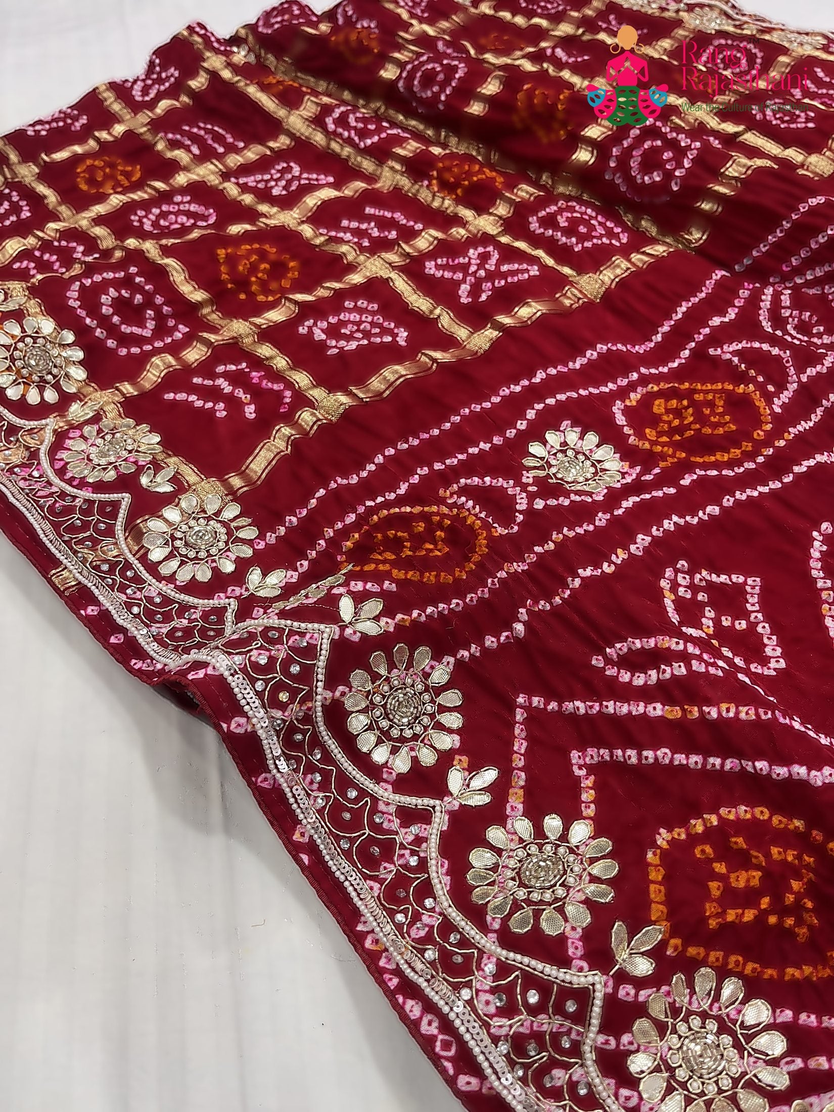close up detailing of red gajji silk gota patti saree