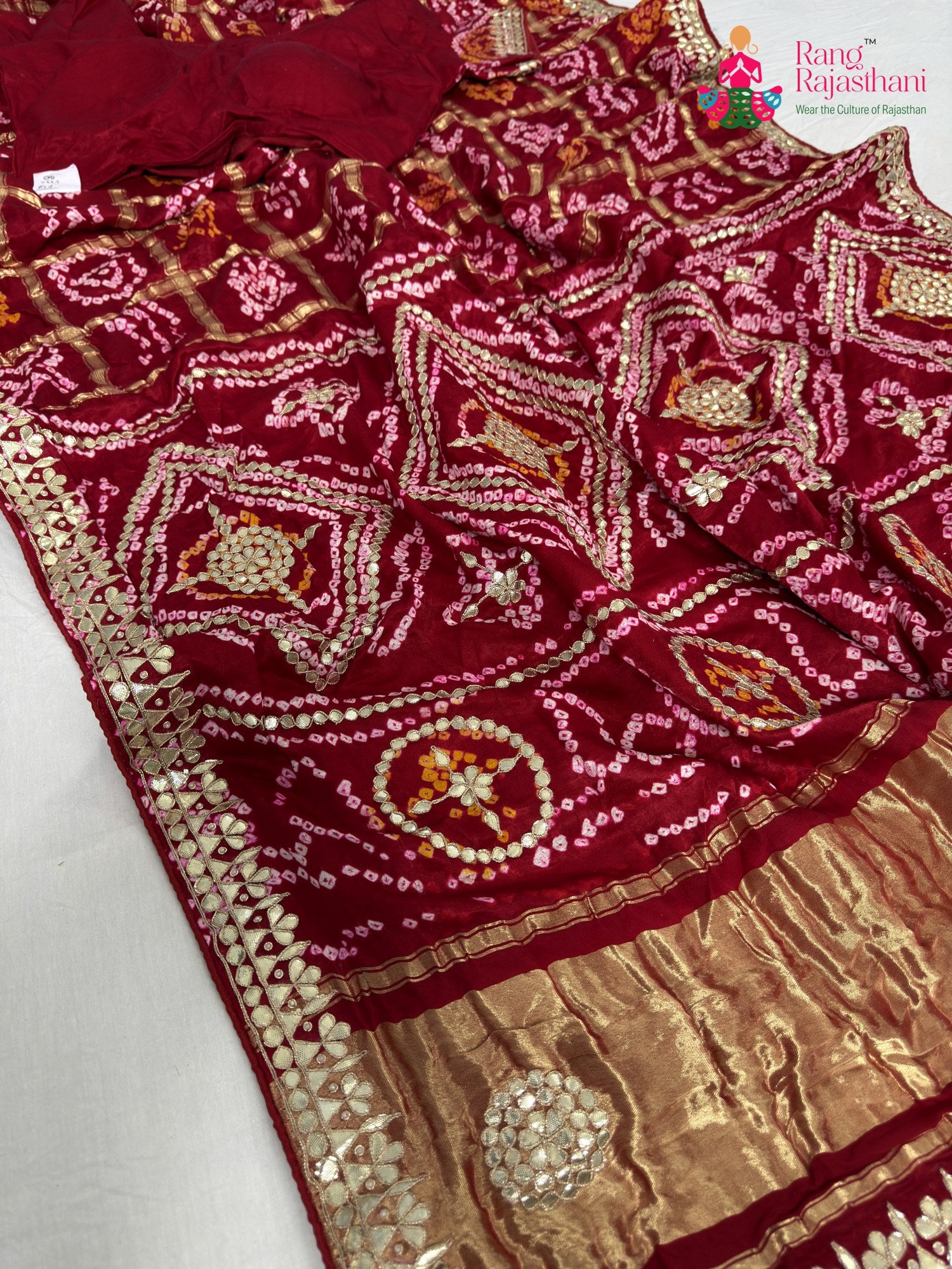 border detailing of red gajji silk gota patti saree
