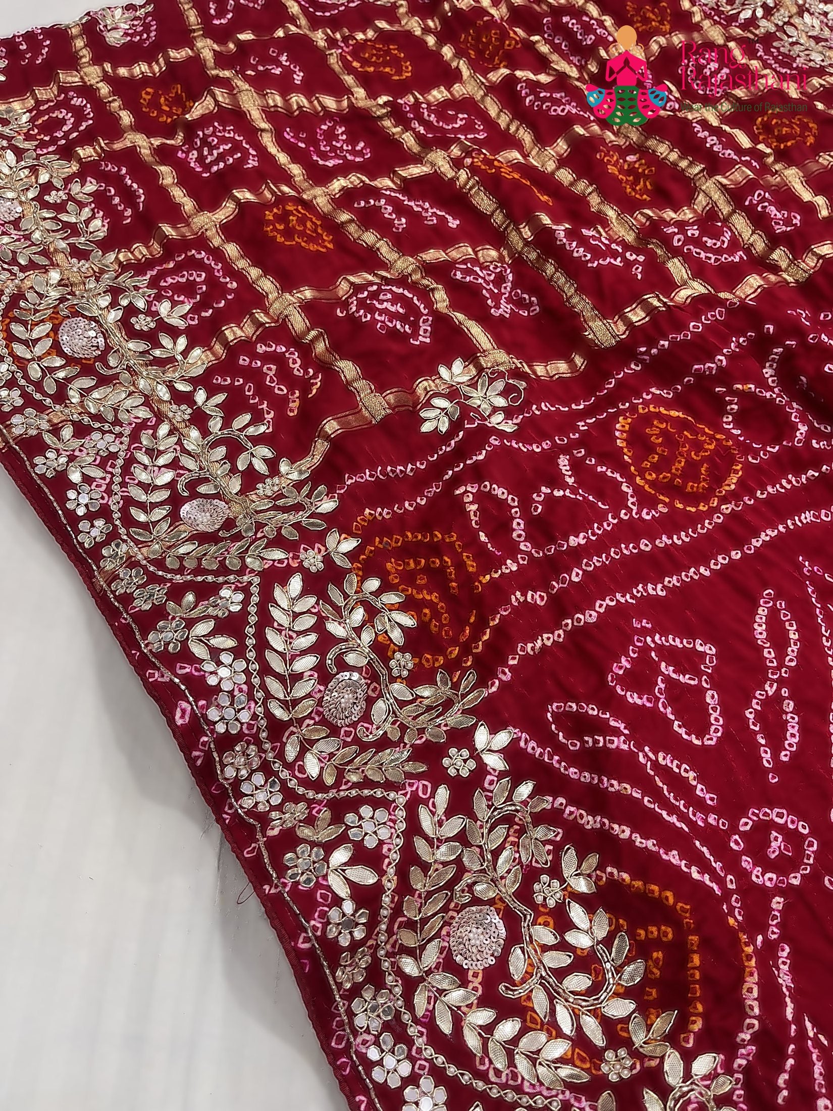 pallu detailing of red gajji silk hand embellishment saree