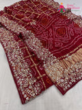 close up detailing of red gajji silk hand embellishment saree