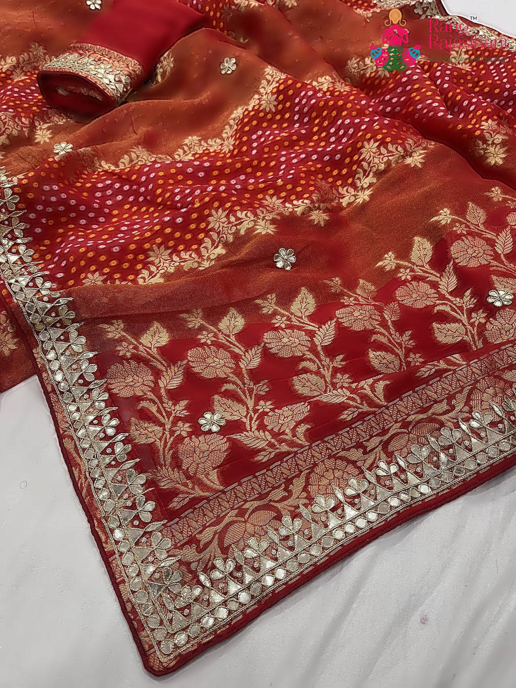 close up detailing of red khaddi gota patti saree 