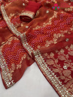 pallu detailing of red khaddi gota patti saree 