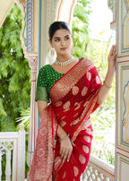 Red Pure Georgette saree with Zari, Butti and Rich Pallu close up detailing