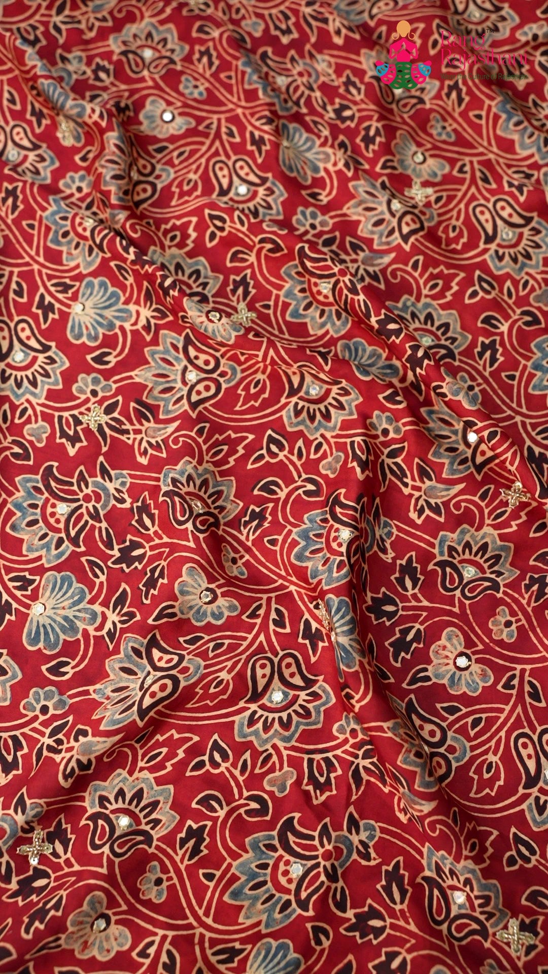 border detail of red modal ajrakh print saree