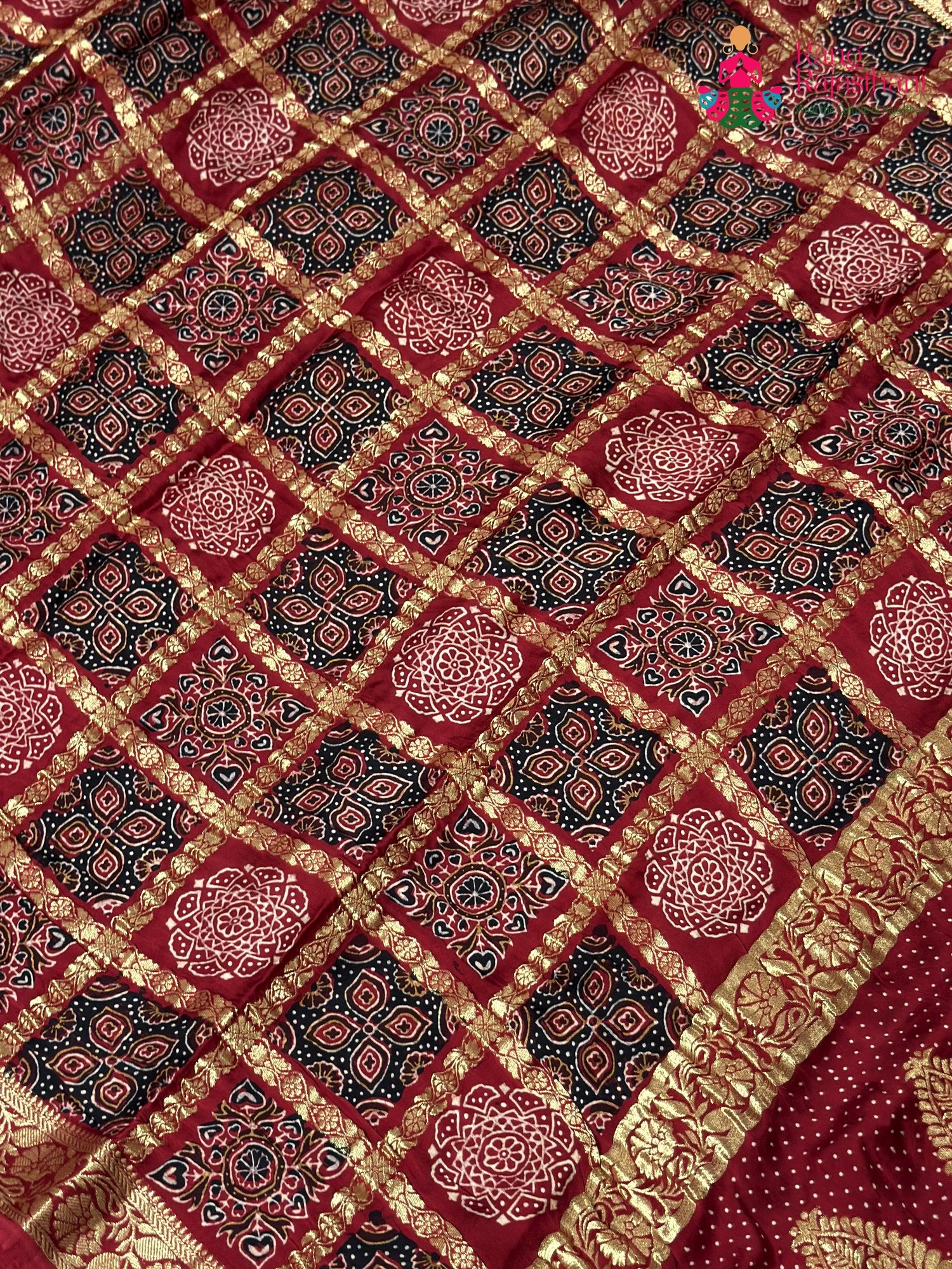 border detail of red modal banarasi zari weave gharchola saree