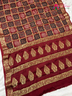 pallu detailing of red modal banarasi zari weave gharchola saree