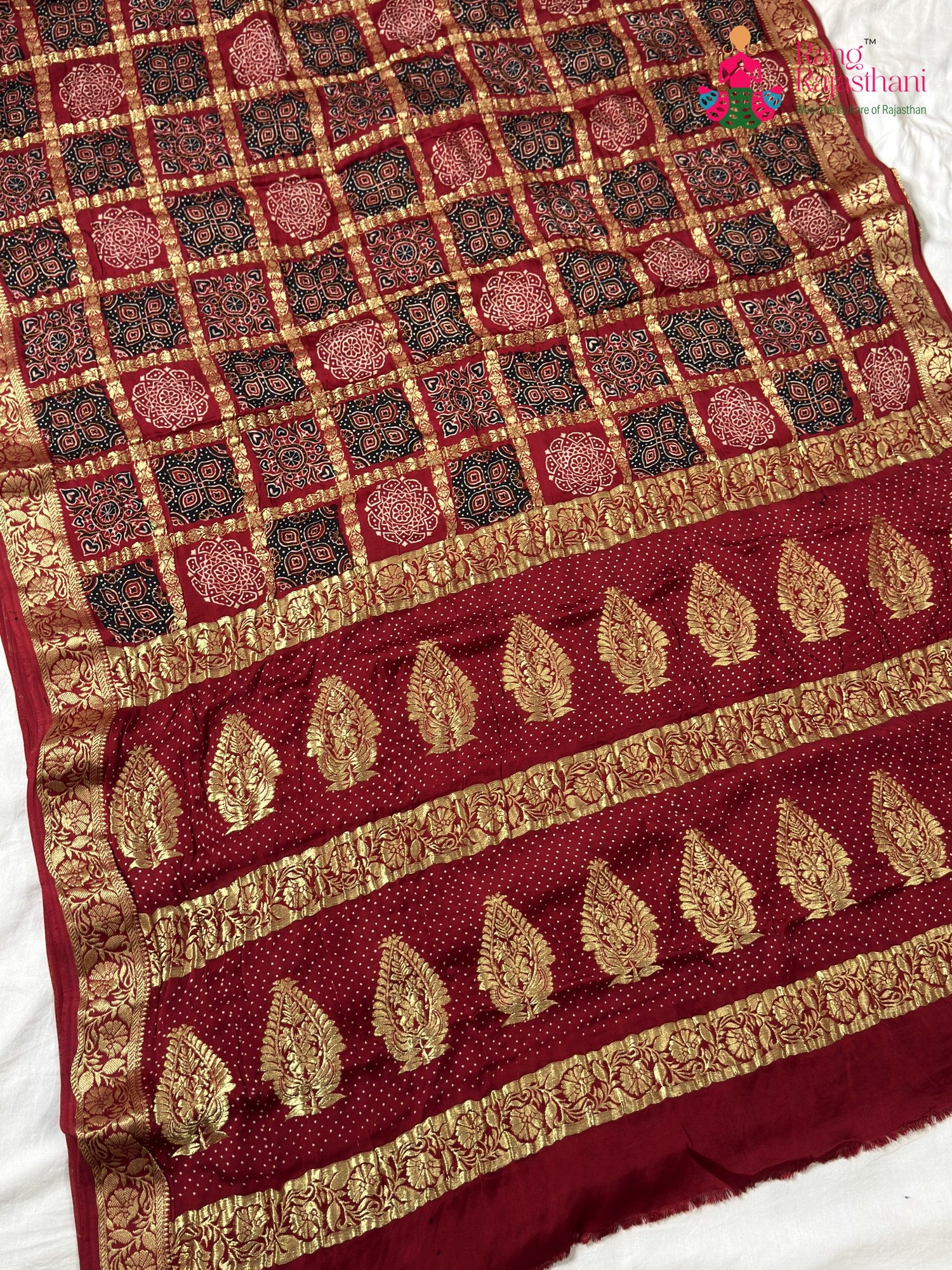 pallu detailing of red modal banarasi zari weave gharchola saree