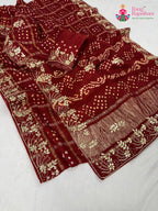 close up detailing of red modal bandhani saree