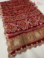 close up detailing of red modal bandhani saree