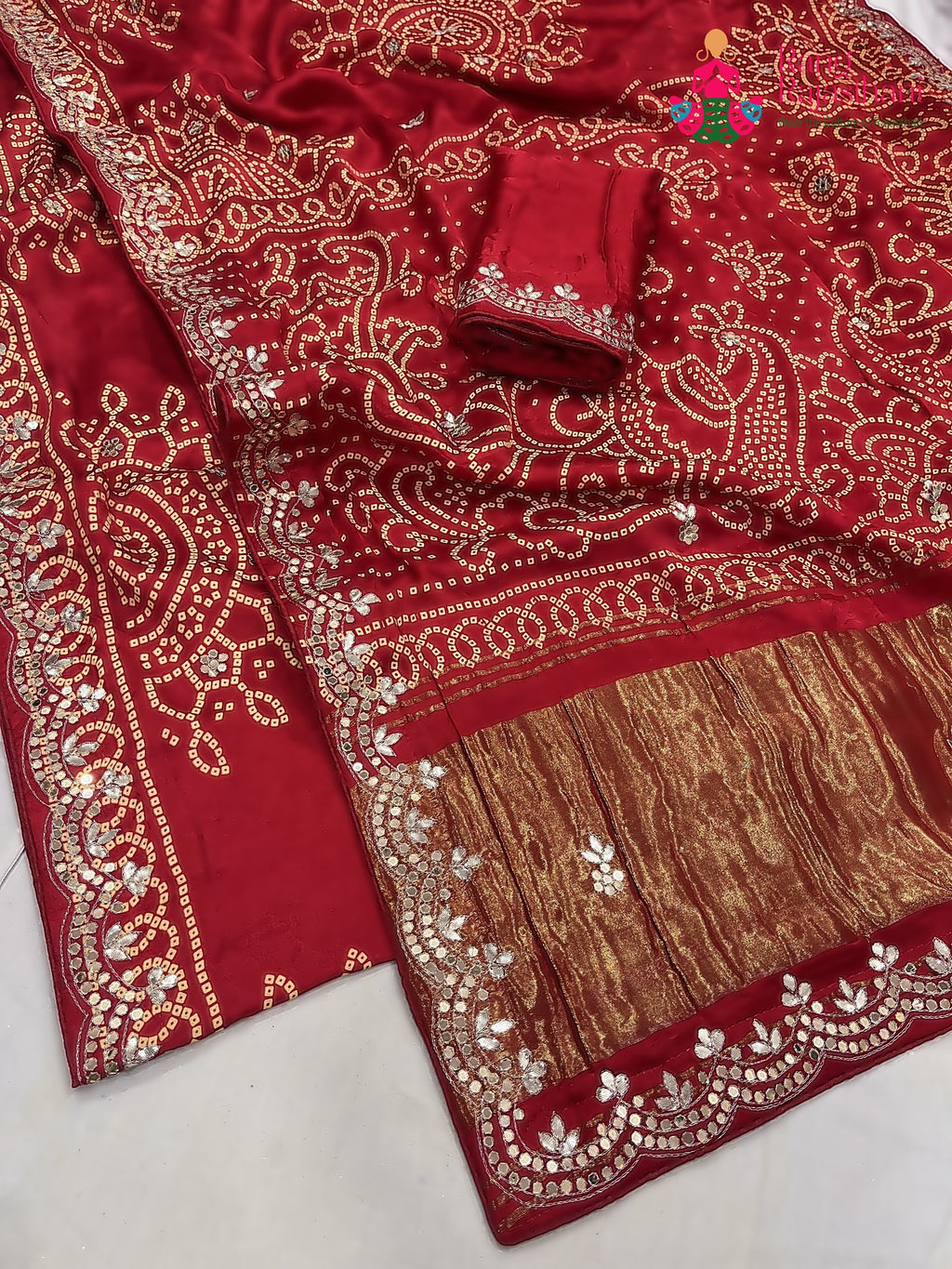 pallu detailing of red modal gota patti saree 