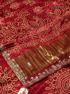 pallu detailing of red modal gota patti saree