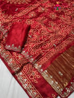 close up view of red modal gota patti saree