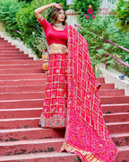 Red Pure Gaji Silk saree with Gottapatti Ghatchola and Bandhani side drape view