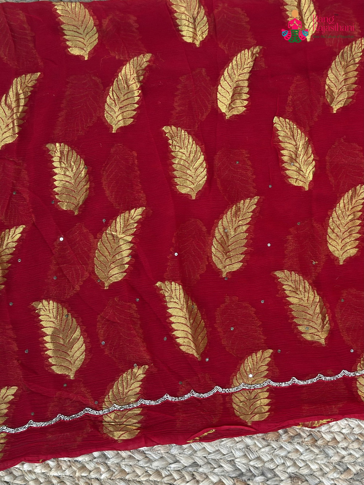 close up view of red pure chiffon hand embellishment saree