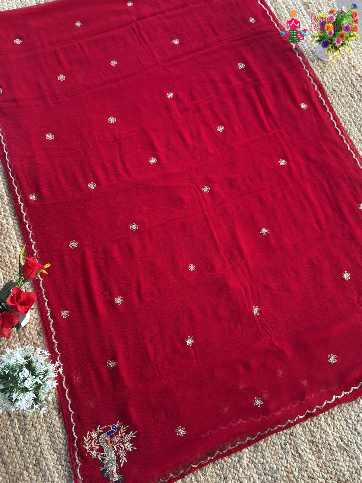 pallu detailing of red pure chiffon rajputi aari tari saree