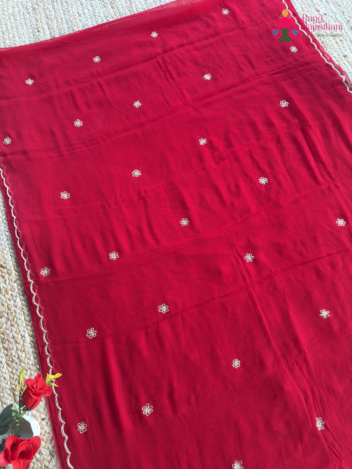 border detail of red pure chiffon rajputi aari tari saree