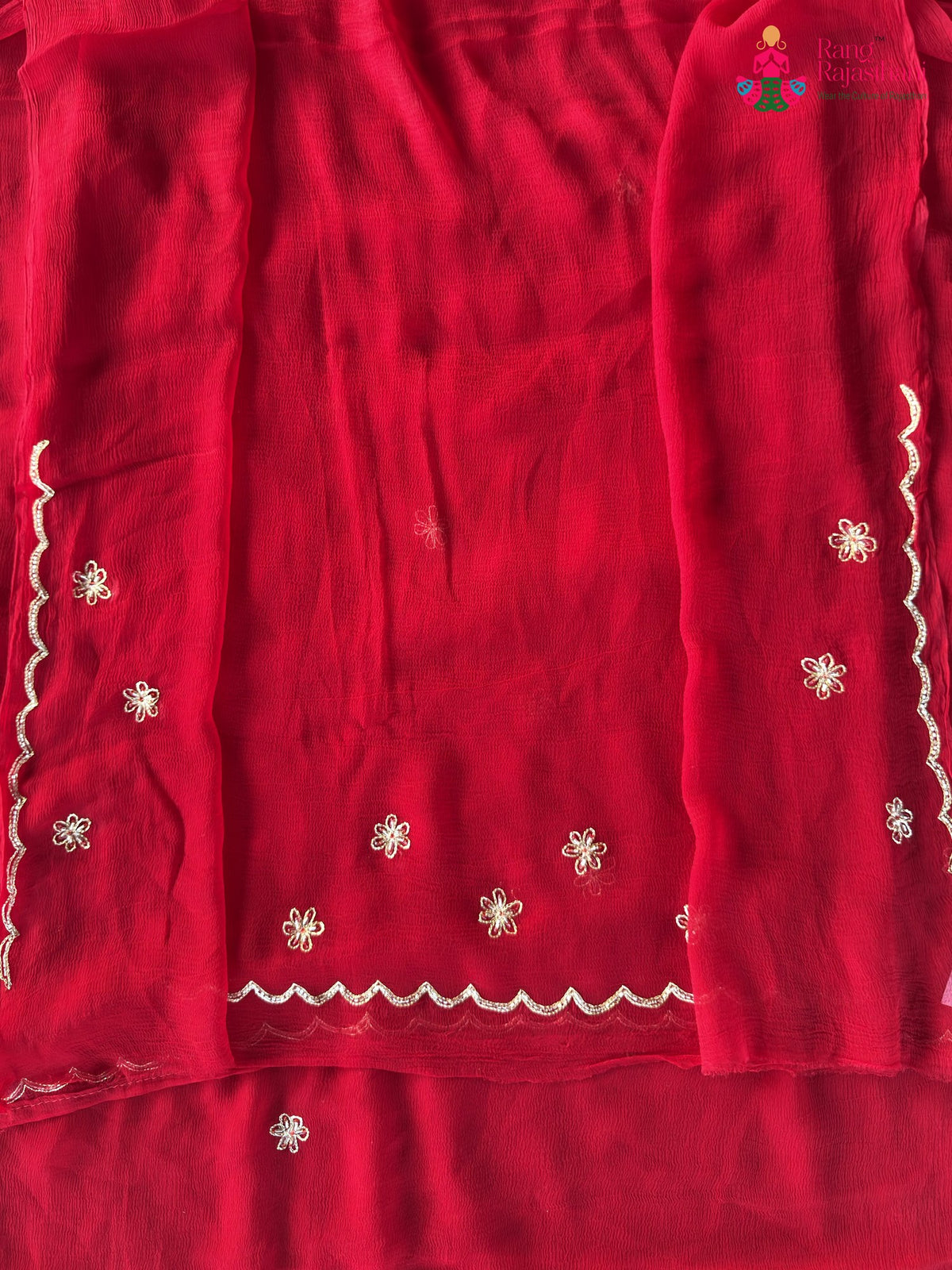 close up view of red pure chiffon rajputi aari tari saree