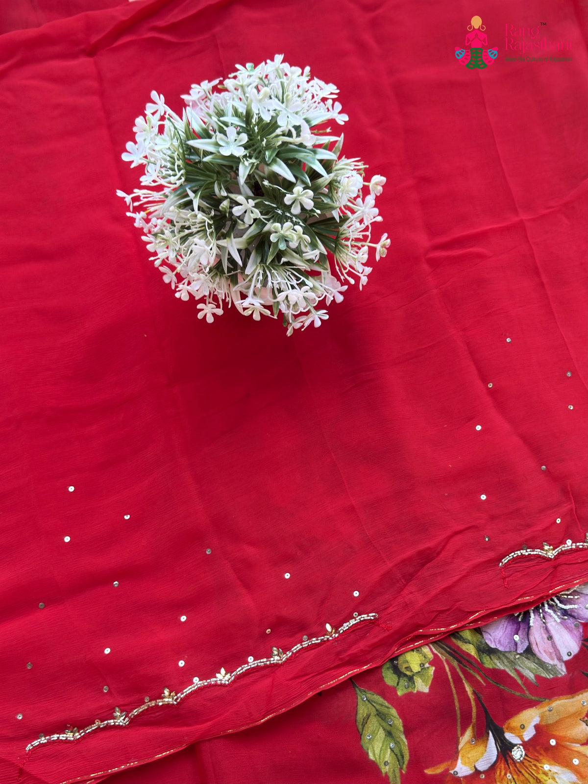 design pattern of red pure chinon hand embellishment saree